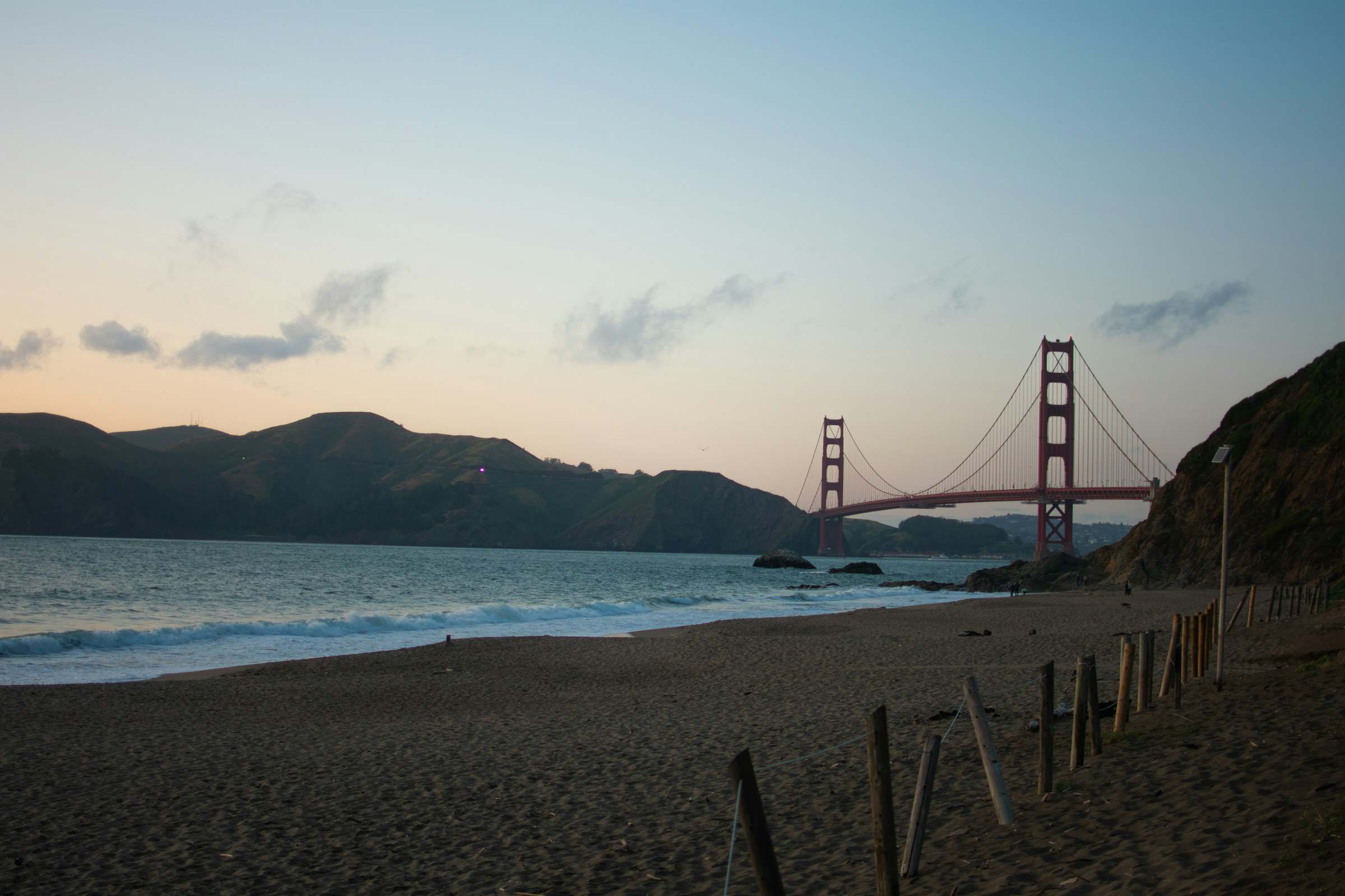 Golden Gate Bridge at dusk seen from Baker Beach